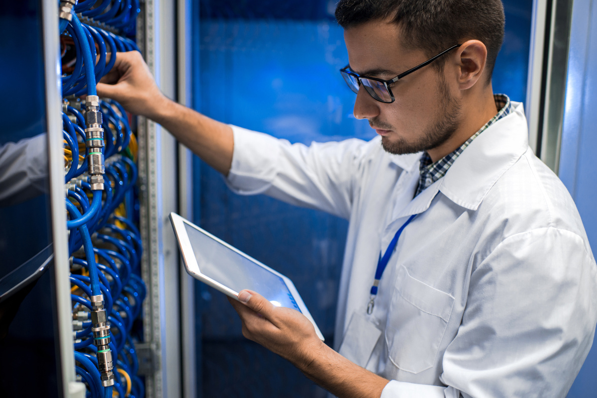A person checking network hardware systems