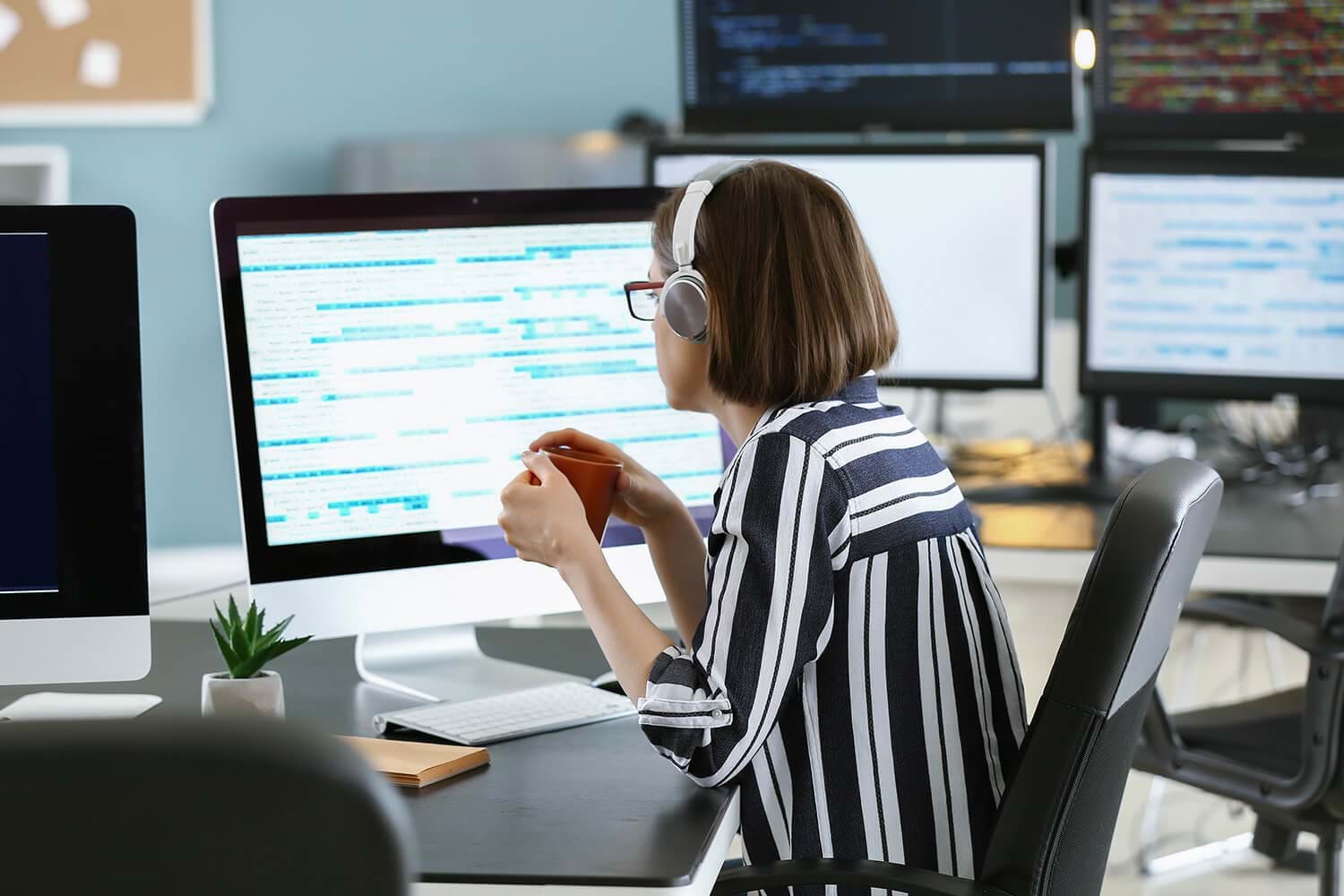vCIO Female programmer working in office